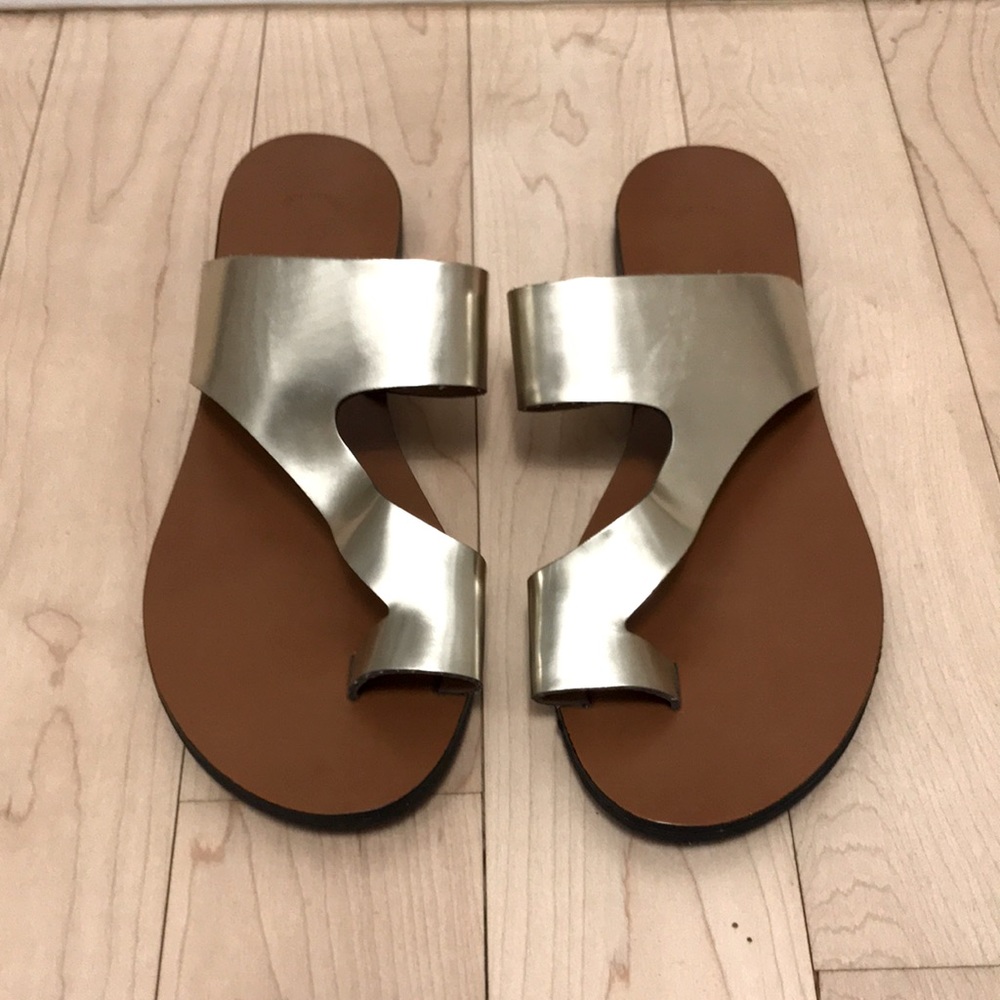 Flat gold sandals